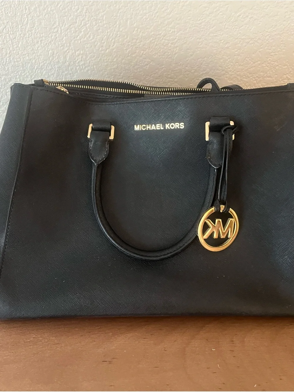 Michael Kors Black Saffiano Leather Tote with Gold Hardware.